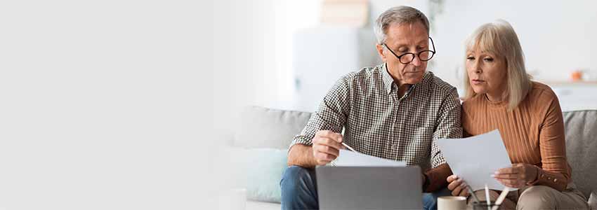 Couple looking at bill